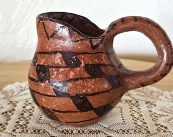 Ancienne gourde ou récipient en cuir probablement origine