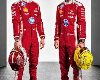 May include: Two individuals wearing matching red racing suits with white side stripes and various sponsor logos including HP, Shell, and IBM. One individual holds a red helmet, while the other holds a yellow helmet. Both wear red racing shoes.