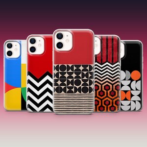 May include: Five smartphone cases arranged in a row, each featuring distinct graphic patterns. Designs include primary color blocks, black and white zigzags, geometric circles and lines, orange and black hexagonal motifs, and a black and white circle grid.