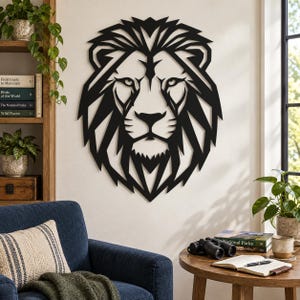 May include: A black wall-mounted lion head sculpture featuring a geometric, stylized design with sharp, angular lines forming the mane and facial features. The piece is crafted from a flat, solid material and displays a symmetrical, bold silhouette.