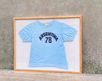 Vintage Tee Made in South America 1978 World Cup Football Soccer Celebration Champions Argentina Framed Straight Grain Maple and Glass