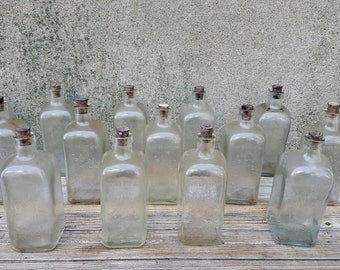 Set of Three Antique Embossed Glass Rochester Germicide Company Liquid Soap Bottles