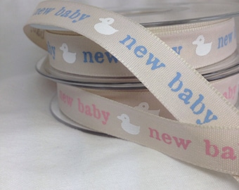Per Metre - Gorgeous &#39;New baby&#39; ribbon in either pink or blue from Berisford Ribbons