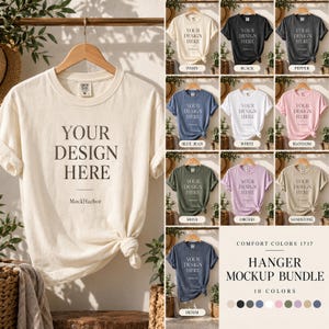 May include: A Comfort Colors 1717 t-shirt mockup bundle featuring ten different colour options. Each shirt is displayed on a wooden hanger with the text 'YOUR DESIGN HERE' and 'MockHarbor' printed on the front. The collection includes ivory, black, pepper, blue jean, white, blossom, moss, orchid, sandstone, and denim colours.