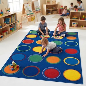 May include: A rectangular blue area rug featuring a repeating pattern of large, solid-colored circles in yellow, orange, red, and green. Each circle is outlined with a thin, contrasting border, creating a vibrant, multi-colored grid design.