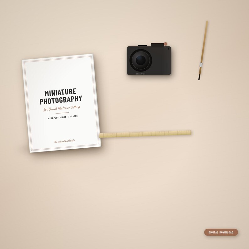 May include: A white rectangular guide titled Miniature Photography for Social Media & Selling, a black digital camera, a thin wooden stick, and a ruler. The text reads A COMPLETE GUIDE - 26 PAGES and Miniature Nest Studio. A digital download button is present.