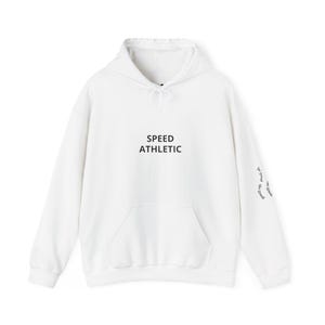 May include: A white hooded sweatshirt featuring a front kangaroo pocket and long sleeves. The text SPEED ATHLETIC is printed in black on the chest. The phrase be good do good is printed in black on the lower portion of the left sleeve.