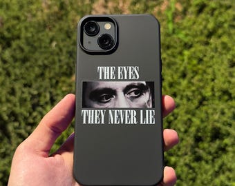 Funda para teléfono con la frase "Los ojos nunca mienten", diseño de ojo en blanco y negro, funda para teléfono con cita.