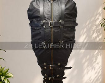 May include: A black leather full-body containment suit featuring a central vertical zip, a high collar with silver-tone studs, and multiple horizontal and vertical adjustable straps with metal buckles. The text ZR LEATHER HIDE is visible.