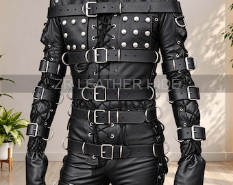 May include: A black leather jacket featuring multiple horizontal buckled straps, silver-toned metal hardware, and circular studs. The garment includes side lacing details and a central lace-up closure. The text ZR LEATHER HIDE is visible.