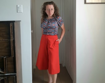 1970s Gaucho Pants. Red Long Shorts. Pant-Man. .