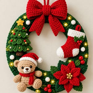 May include: A circular green crochet wreath featuring a large red bow at the top, a small crocheted Christmas tree, a red and white stocking, a tan teddy bear wearing a red hat and scarf, and a red poinsettia flower with small LED lights.