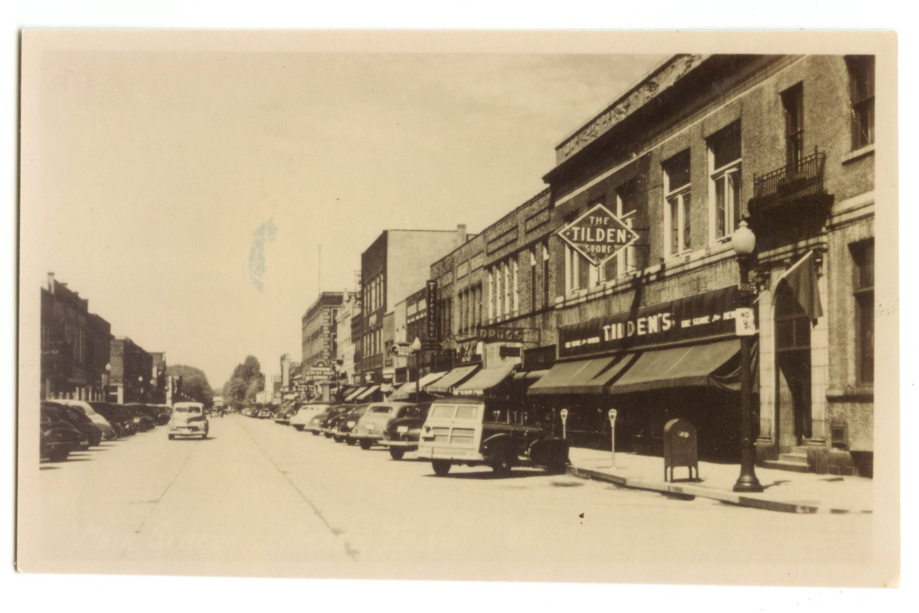 Ames Iowa Main Street the Tilden Store, Firestone, Rexall, Delivery Van