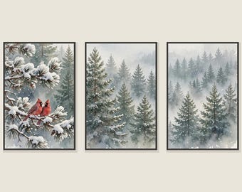 May include: A triptych of framed wall art prints featuring a winter forest scene. The left panel shows two red cardinals perched on a snow-covered pine branch. The centre and right panels depict a dense, misty evergreen forest with snow.