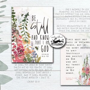 May include: A watercolour floral design with a quote from Psalm 46:10, "Be still and know that I am God." The quote is surrounded by pink, purple, and green flowers and leaves. The background is white.