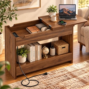 May include: A walnut-finished wooden console table featuring a lift-top mechanism that reveals a storage compartment. The table includes a built-in power strip with outlets, a lower shelf holding books, a globe, and a woven basket, plus a laptop on top.