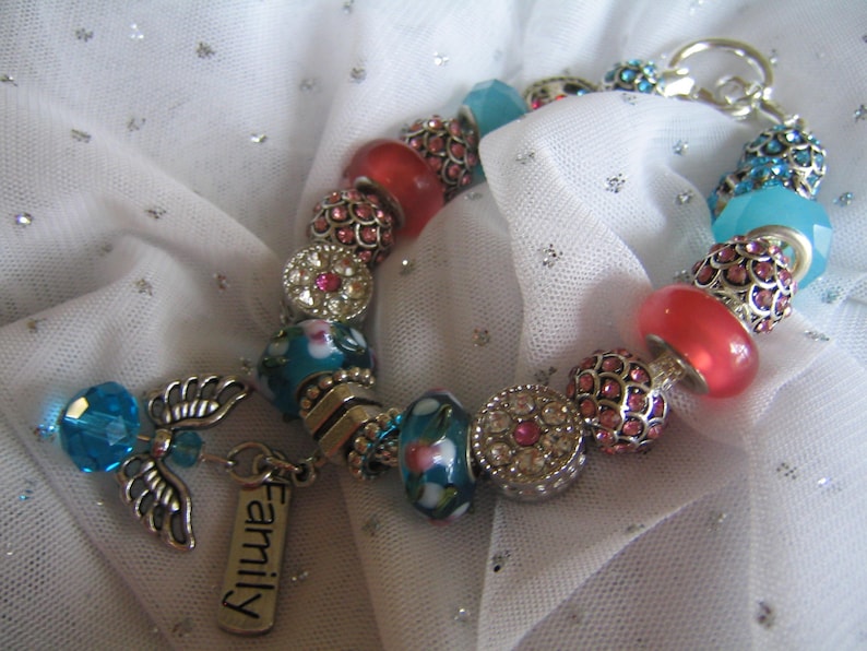 by TLCcharms FAMILY ANGEL...Silver Charm Bracelet with Aqua and Pink European Beads..