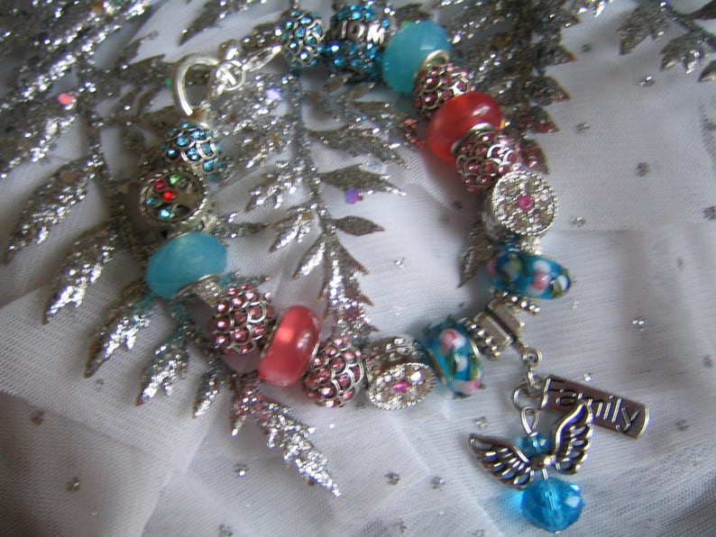 by TLCcharms FAMILY ANGEL...Silver Charm Bracelet with Aqua and Pink European Beads..