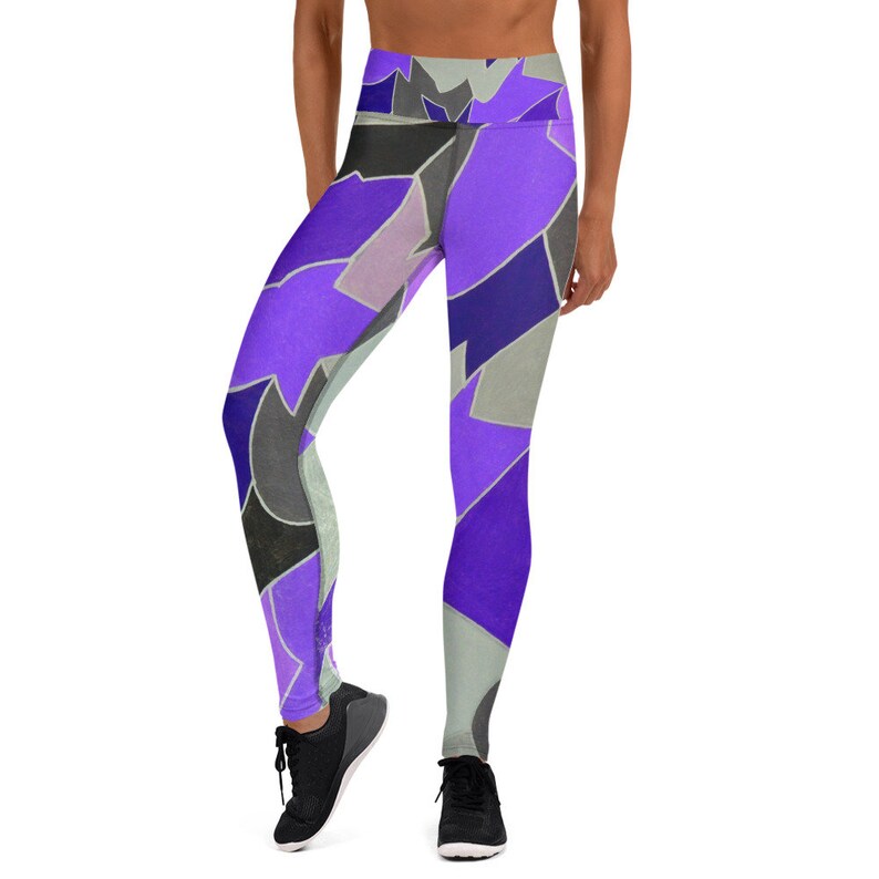 May include: Purple, blue, and gray patterned yoga leggings with a high waist.