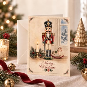May include: A greeting card featuring a nutcracker in a red and gold uniform, a lit candle in a brass holder, and a small rocking horse. The text Merry Christmas is printed in red script at the bottom, framed by a decorative border.
