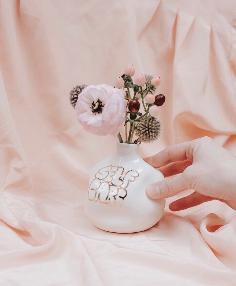 Self Care Handthrown and distorted ceramic budvase Porcelain clay and white glaze 22k Gold lettering