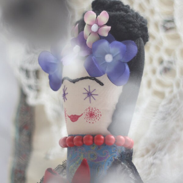 Reserved, Frida Doll