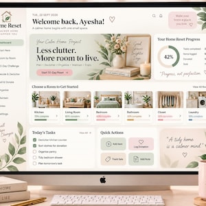 Op de afbeelding: Een computermonitor die de Home Reset dashboard-interface weergeeft met een licht kleurenpalet, met navigatiemenu's, voortgangsgrafieken, kamerselectiekaarten en takenlijsten. Het scherm bevat tekst zoals Welcome back, Ayesha, Less clutter, More room to live en A tidy home is a calmer mind, omringd door botanische bladillustraties.