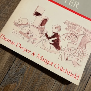 May include: The cover of a book titled "The Personal Computer" by Thomas Dwyer & Margot Critchfield. The cover features a line drawing of a person sitting at a computer.