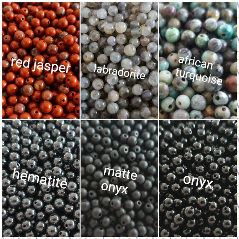 May include: Assortment of gemstone beads in various colors, including red jasper, labradorite, African turquoise, hematite, matte onyx, and onyx. The beads are all round and have a smooth finish.