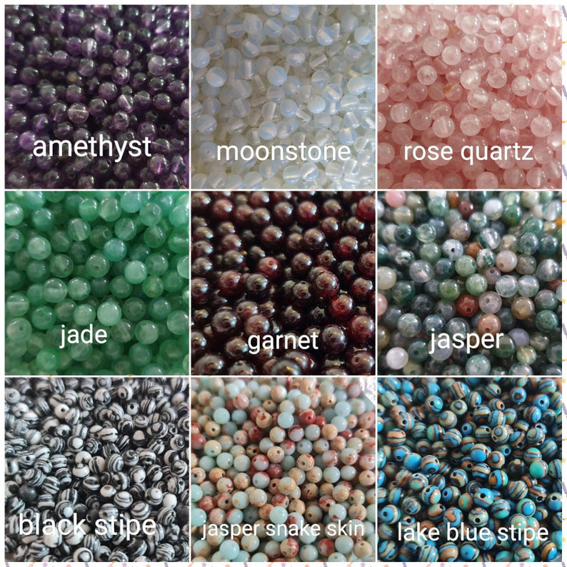 May include: Assortment of gemstone beads in various colors, including amethyst, moonstone, rose quartz, jade, garnet, jasper, black stripe, jasper snake skin, and lake blue stripe.