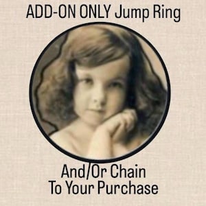 May include: Image with text: "ADD-ON ONLY Jump Ring And/Or Chain To Your Purchase." A sepia-toned image of a young girl in a black circular frame. The girl is looking at the viewer with her chin resting on her hand.