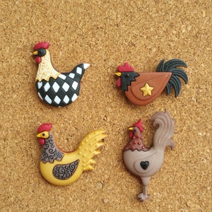May include: Four colorful ceramic rooster figurines with different patterns and designs. The roosters are brown, black, white, and yellow with red accents.