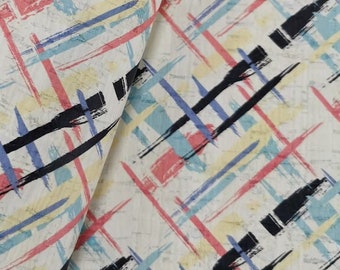 May include: Abstract pattern fabric with a white background and colorful lines in shades of blue, pink, and yellow. The lines are arranged in a grid pattern and have a brushstroke effect.