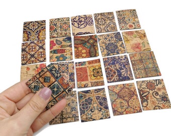 May include: A set of 20 cork tiles with colorful patterned designs inspired by traditional Moroccan tiles. The tiles are square and have a cork backing.