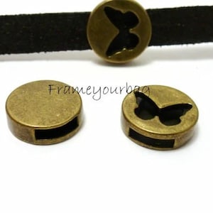 6 ZAMAK Beads butterfly antique brass color.Ø 10mmx3mm ( ZK87)