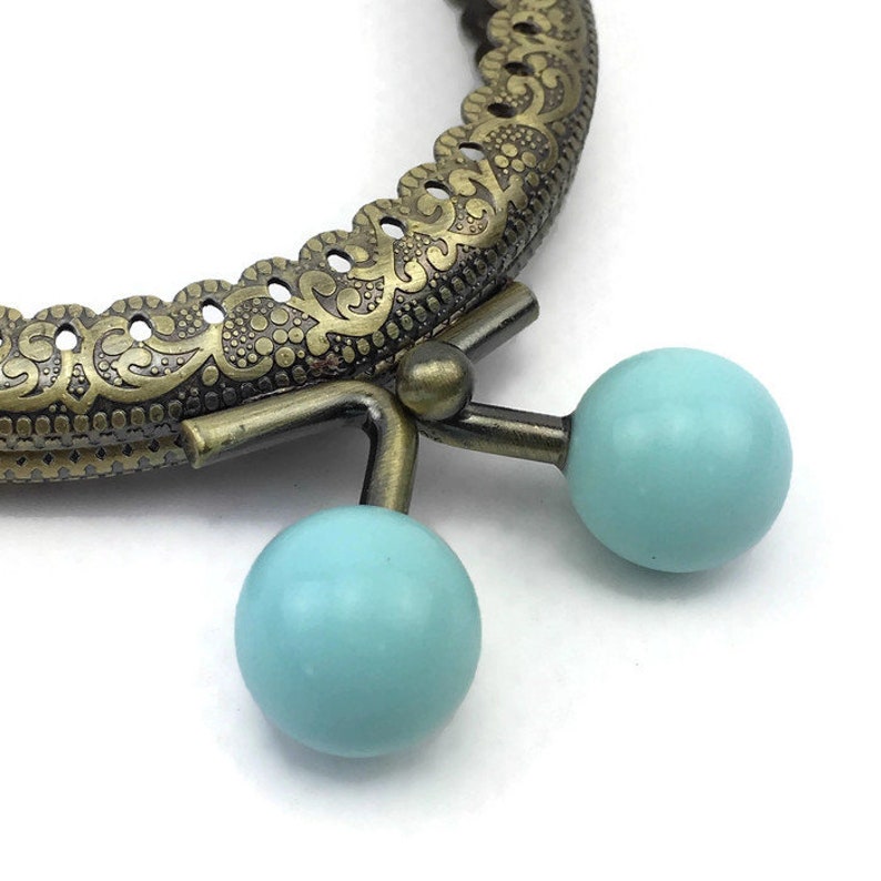 3,35 in 1 purse frame 8.5 cm Colored bobble Blue antique brass sewing one loops F8422