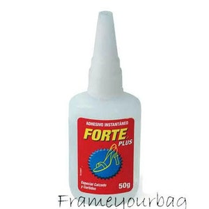May include: A clear plastic bottle of Forte Plus instant adhesive, labelled "Adhesivo Instantaneo Forte Plus". The bottle is red and white with a picture of a red shoe on it. The bottle is 50g.