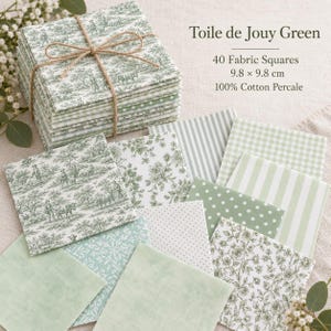 May include: A stack of 40 fabric squares tied with twine, labeled Toile de Jouy Green, 9.8 x 9.8 cm, 100% Cotton Percale. The squares feature various green and white patterns, including pastoral scenes, floral prints, stripes, polka dots, and gingham checks.
