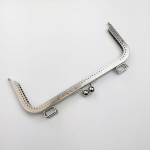 Marco para bolso de mano de 24 cm x 9,5 cm, para coser en tono plateado, con presillas para asa F24/1187