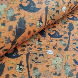 May include: Orange cork fabric featuring a Halloween pattern. The design includes jack-o'-lanterns, witch hats, ghosts, brooms, and the word "Boo!" in a speech bubble. Other elements include candles, leaves, and mushrooms.