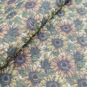 May include: A fabric featuring a repeating pattern of sunflowers on a beige background. The sunflowers are drawn in a vintage style with brown, yellow, and green colours.