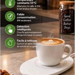 Pode incluir: Um aquecedor de chávenas elétrico oval branco com superfície de vidro, com uma temperatura constante de 55°C e um baixo consumo de 8W. O dispositivo inclui deteção inteligente para aquecer automaticamente uma chávena de cerâmica branca.