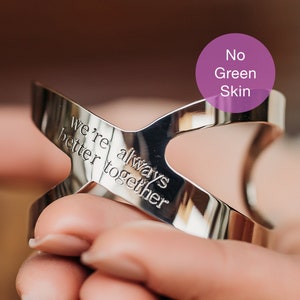 May include: Silver bracelet with the inscription "we're always better together".