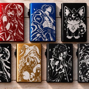 May include: A collection of seven rectangular metal cases featuring engraved anime-style illustrations. The designs include various characters, a creature, and a wolf, rendered in white lines against red, blue, black, and gold metallic backgrounds.