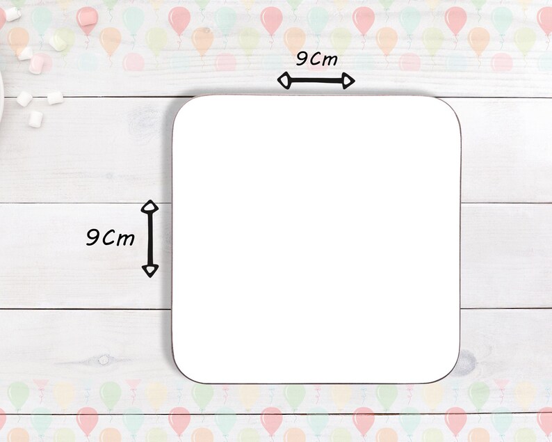 May include: A square, white coaster with rounded corners, measuring 9 cm by 9 cm. The coaster is blank, ready for customization. The background features a light wood grain pattern and a border of colorful balloons.