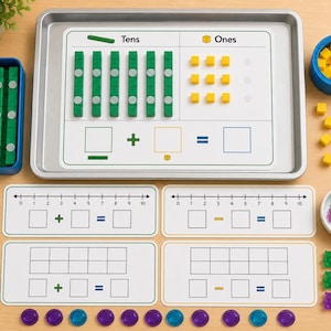 Puede incluir: Juego educativo de aprendizaje de matemáticas con bloques de conteo verdes y amarillos, rectas numéricas y marcadores. El juego incluye una bandeja con las etiquetas "Decenas" y "Unidades", junto con contadores y manipulativos coloridos.