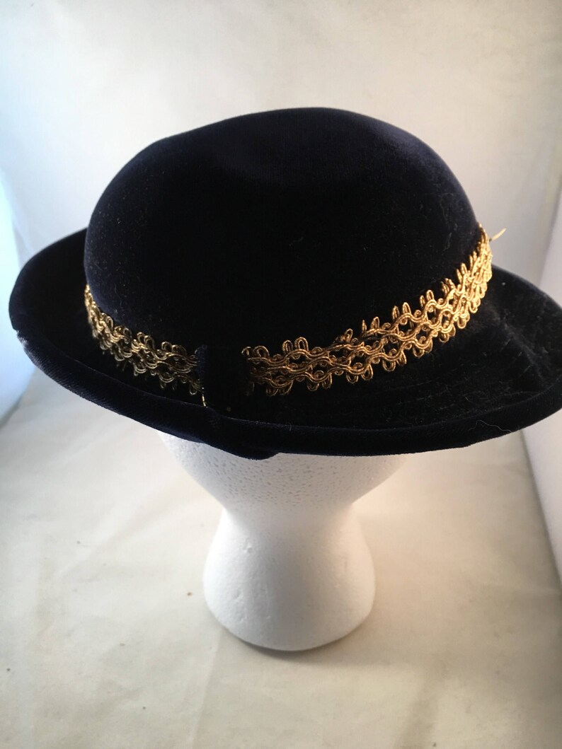 Navy velvet hat with gold and pearl trim