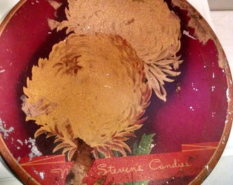 Mrs. Steven's candies tin with vintage sewing supplies
