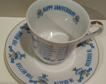 Beautiful Anniversary / wedding themed tea cup and saucer