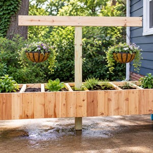 May include: A rectangular wooden planter box with light blue metal legs and a central vertical post supporting a horizontal beam. Two hanging baskets with green plants and purple flowers are suspended from the beam, while the planter holds soil.